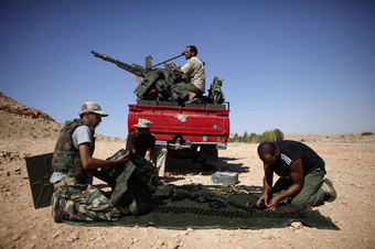 Pick-upy a rebelové v Libyi.